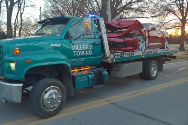 🔧 "Millers Towing ICT flatbed tow truck in Wichita, Kansas"