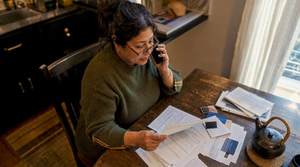 Person verifying tow company insurance and licensing